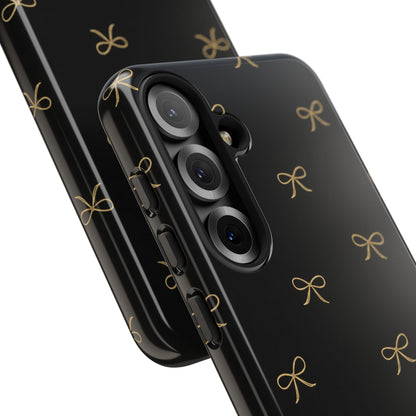Black Phone Case with Gold Bow Pattern – Slim Protective Cute Aesthetic Cover for Iphone, Samsung Galaxy and Pixel