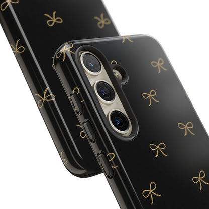 Black Phone Case with Gold Bow Pattern – Slim Protective Cute Aesthetic Cover for Iphone, Samsung Galaxy and Pixel
