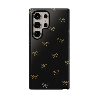 Black Phone Case with Gold Bow Pattern – Slim Protective Cute Aesthetic Cover for Iphone, Samsung Galaxy and Pixel