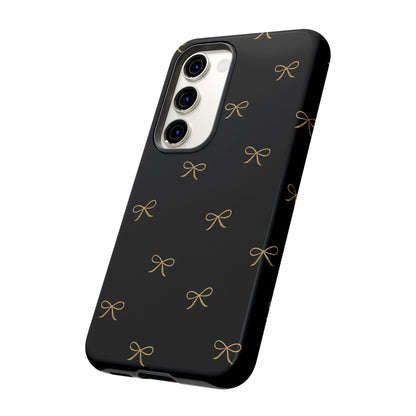 Black Phone Case with Gold Bow Pattern – Slim Protective Cute Aesthetic Cover for Iphone, Samsung Galaxy and Pixel