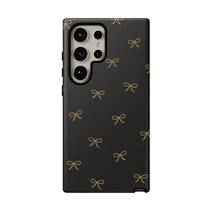 Black Phone Case with Gold Bow Pattern – Slim Protective Cute Aesthetic Cover for Iphone, Samsung Galaxy and Pixel