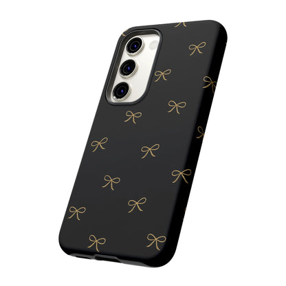 Black Phone Case with Gold Bow Pattern – Slim Protective Cute Aesthetic Cover for Iphone, Samsung Galaxy and Pixel